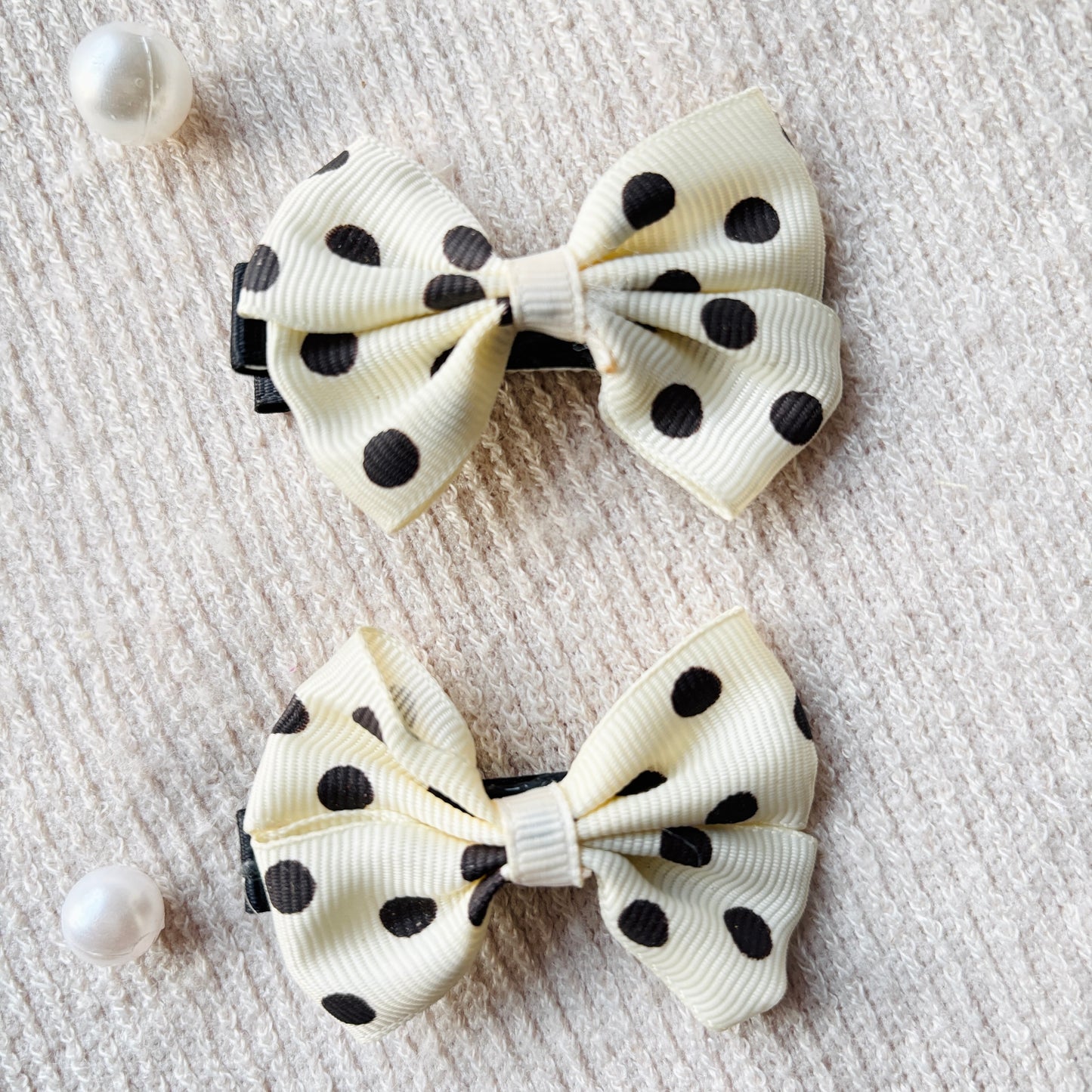 Cream polka bow alligator clips