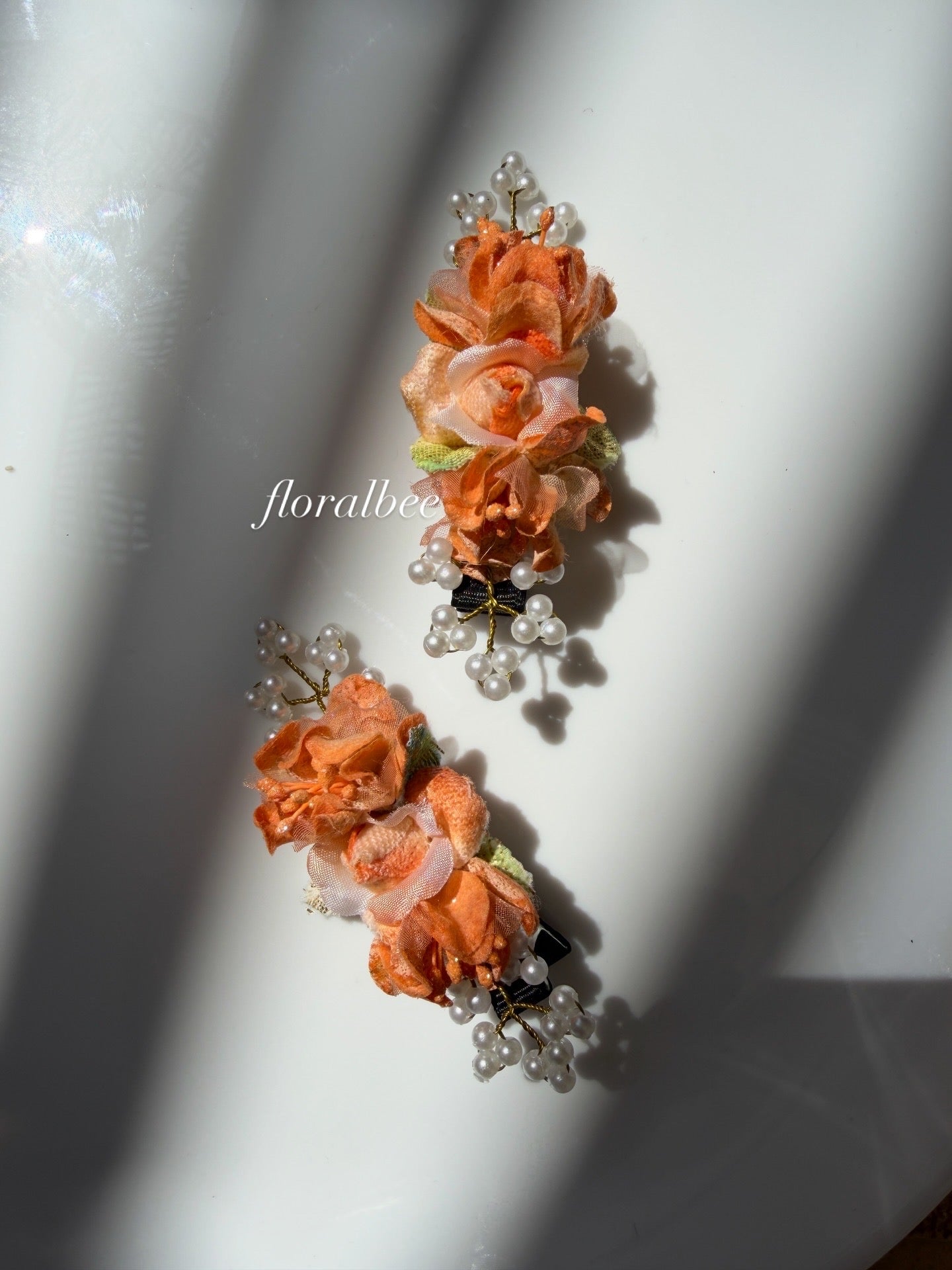 Orange floral alligator clips