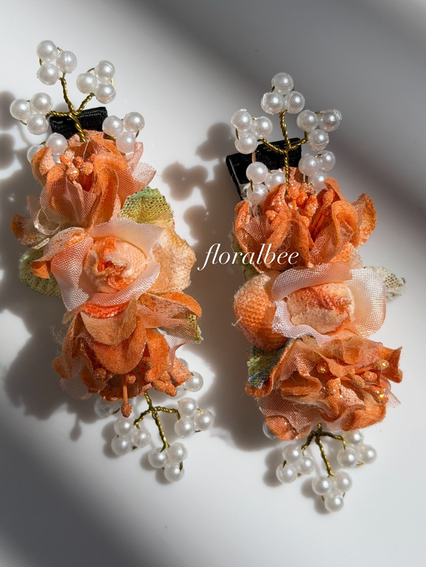 Orange floral alligator clips