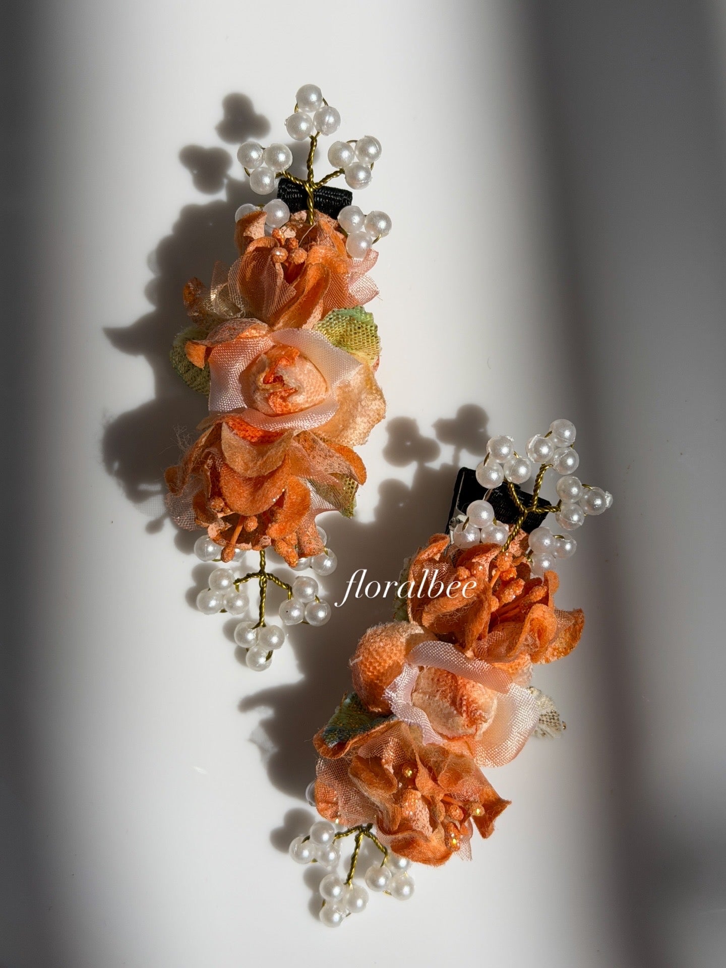 Orange floral alligator clips