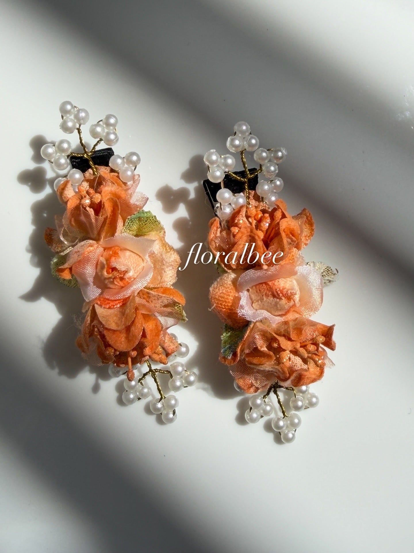 Orange floral alligator clips