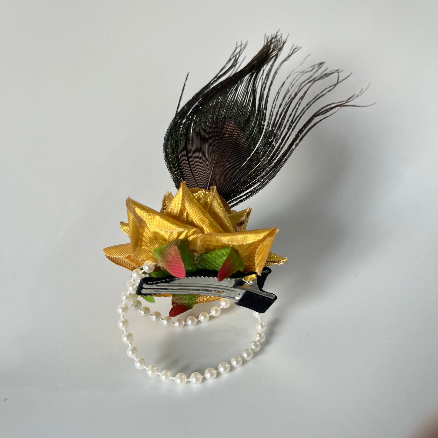 Janmashtami special Golden rose alligator clip with peacock feather