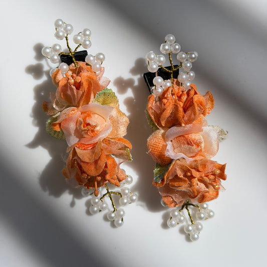 Orange floral alligator clips